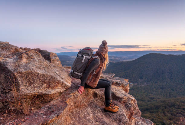 istock Mountain wanderings, hiker rests taking in spectacular views 1031401044