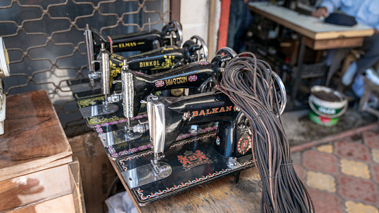 Adiyaman, Turkey - July 2018: Old sewing machines on display in the Adiyaman city historical old Oturakci bazaar inside the old city, Turkey