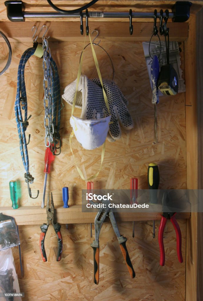 Worktools Close-up of tools hanging on wall Argentina Stock Photo