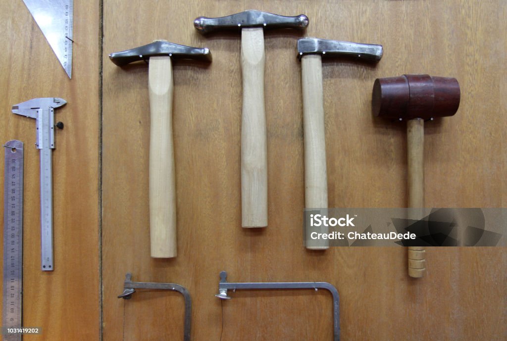 Worktools Close-up of tools hanging on wall Abundance Stock Photo