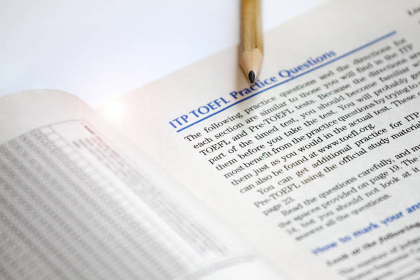 Test of English as a Foreign Language, TOEFL Test sheets. TOEFL exam. TOEFL practice questions. Learning English. English as a second language. Student and Do You Speak English concept. USA College and university education and testing system.