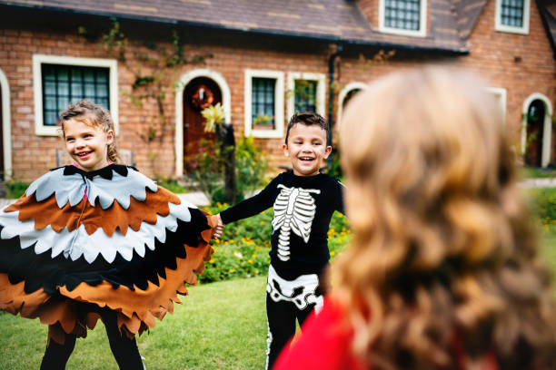 istock Little kids at a Halloween party 1031429062