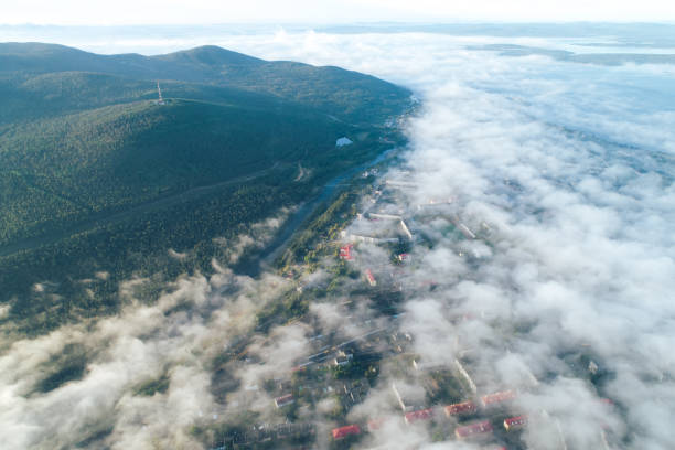 istock City under the Low Cloud Cover. Aerial View from the Drone 1031445714