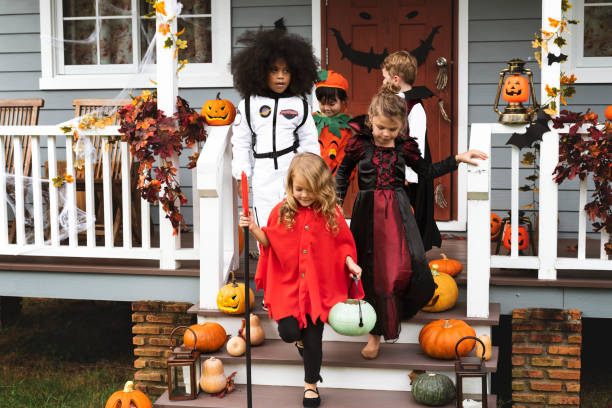 istock Young kids trick or treating during Halloween 1031445796