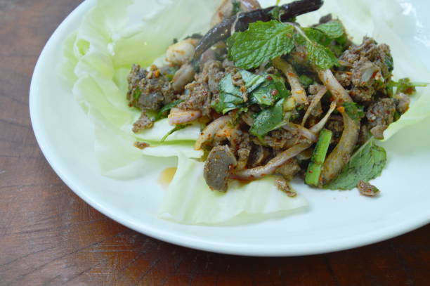istock Thai spicy chop duck meat salad and fresh cabbage 1031450726