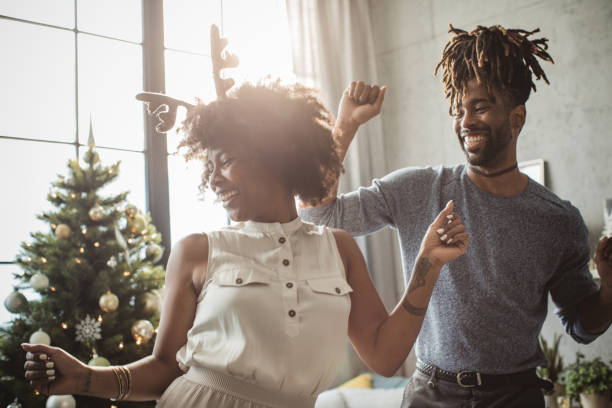 istock Couple dancing on Christmas 1031454238