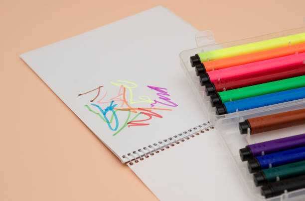 istock Colorful marker on light pink background 1031454950