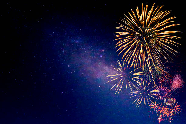 istock Fireworks with blur milky way background 1031459044