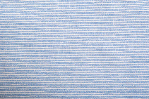 Blue and white striped seamless fabric.Close up