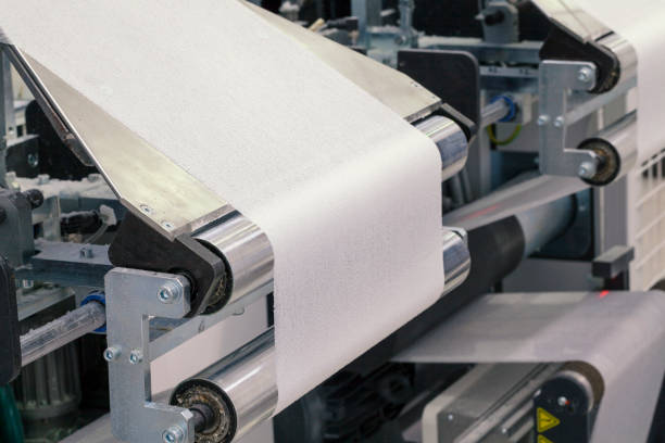 paper roll machine stock photo