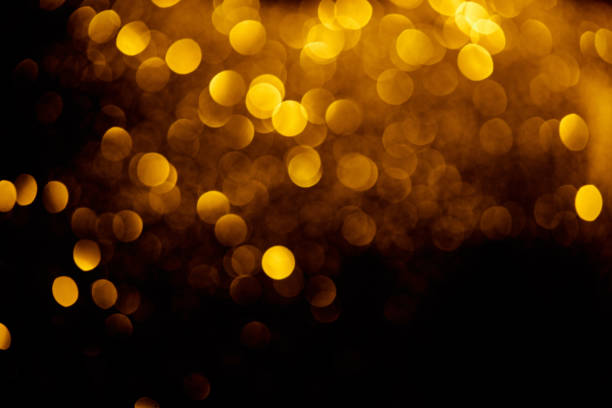 istock abstract decorative background with blurred golden glitter 1031463574