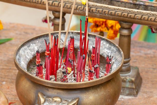 istock close up of Burning red Incense sticks 1031467662