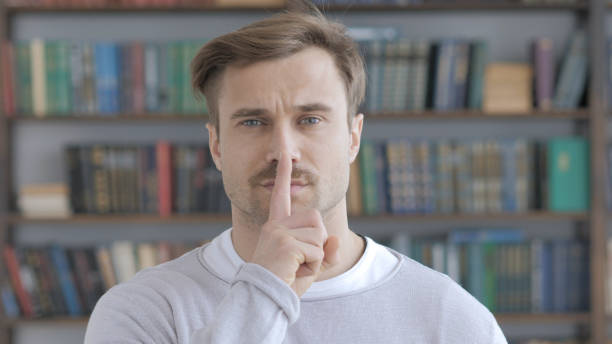 istock Silent, Silence Gesture by Adult Man 1031471740