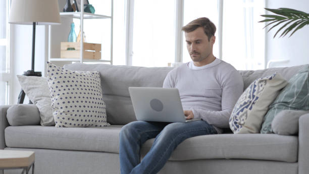 istock Adult Man Working On Laptop in Office 1031471868