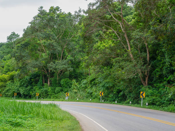 istock Left Turn Sign , Road signs warn of a sharp turn. 1031477602