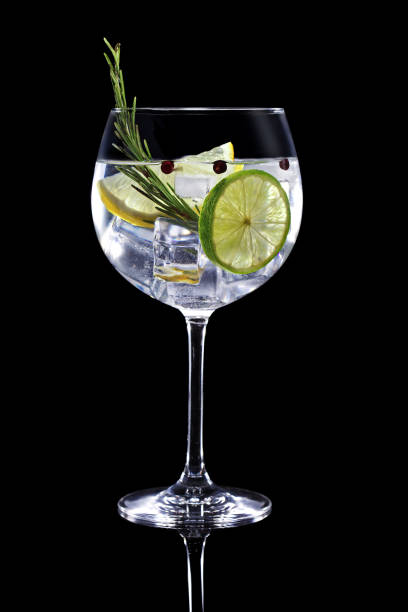 gin tonic cocktail isolated on black background