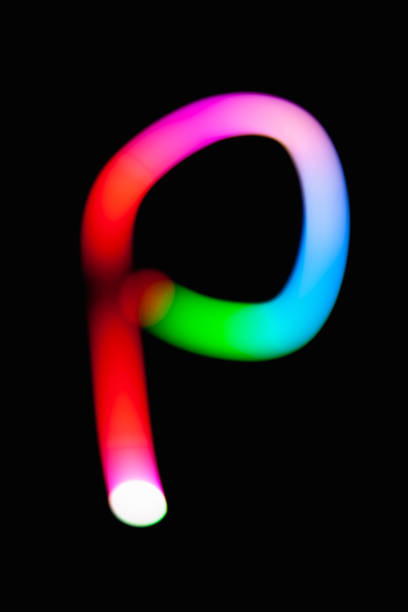 istock Letter P. Glowing letters on dark background. Abstract light painting at night. Creative artistic colorful bokeh. New Year. Use it for build you own design for book cover, CD, poster or post card. 1031481812