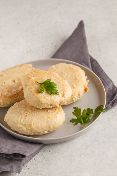 istock Steam chicken cutlet on a white plate, white background. 1031485462