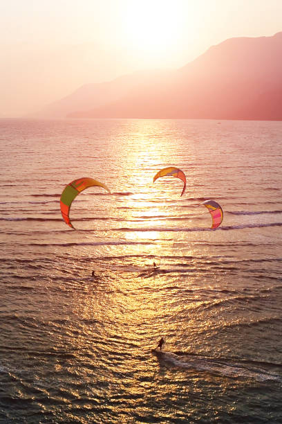 istock people kitesurfing in the sun 1031485922