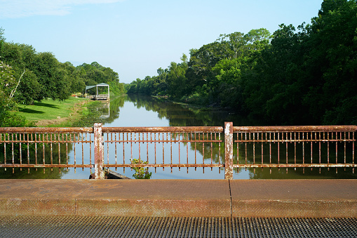 A rusty and dilapidated Bridge over Bayou Teche in Breaux Bridge, Louisiana, United States.