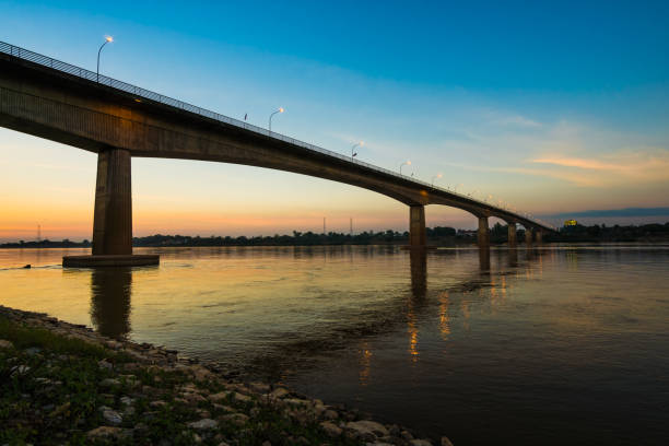 istock Thai-Laos Friendship Bridge on sunset background 1031486222