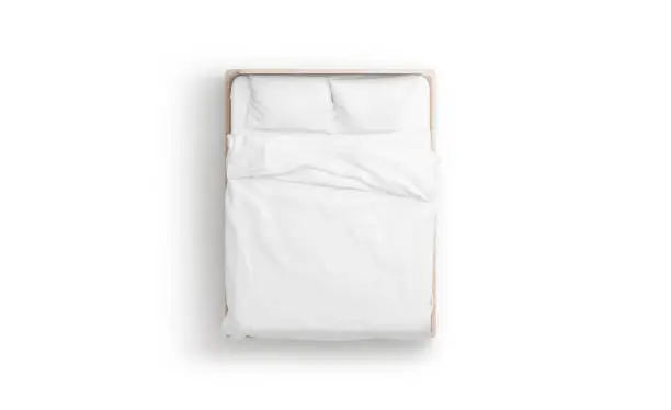 Photo of Blank white bed mock up, top view isolated,
