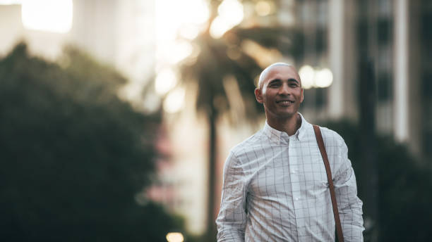 istock Businessman walking on street to office 1031497540
