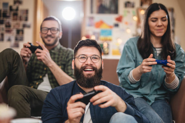 Good friends competing in gaming at home