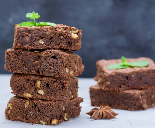 istock pieces of chocolate brownie pie with walnuts 1031499898