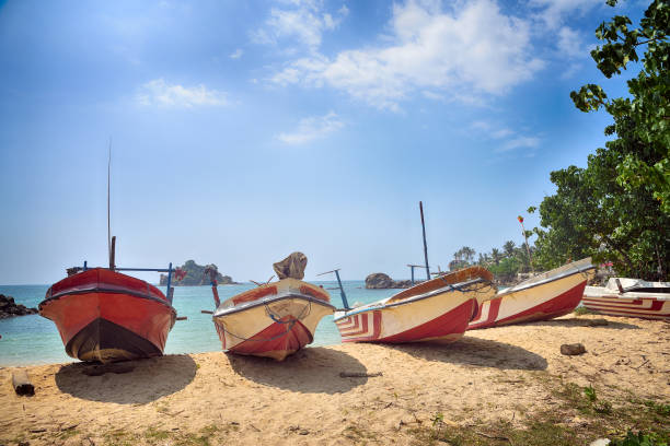 istock fishing boats on the shore 1031505964