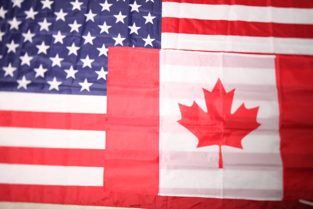 istock american and canadian flag 1031508616