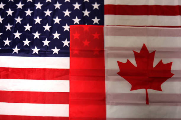 istock american and canadian flag 1031508670