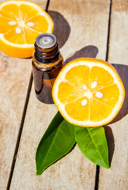 istock Lemon essential oil in a small bottle. Selective focus. 1031510794