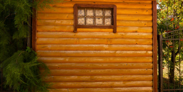 windows on a wooden house