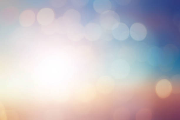 istock blurred beautiful natural pastel background lens ray flare flash light with double exposure of bokeh light 1031518666