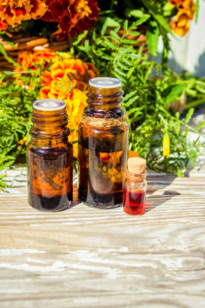 istock nettle tincture in a small bottle and fresh leaves on white wood, medicinal herb for overweight, diabetics and kidney weakness, selected focus, narrow depth of field 1031522514