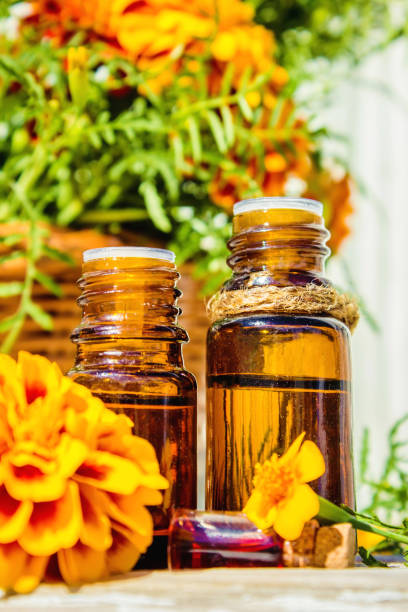 istock nettle tincture in a small bottle and fresh leaves on white wood, medicinal herb for overweight, diabetics and kidney weakness, selected focus, narrow depth of field 1031522518