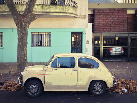 Buenos Aires, Argentina - June 10, 2017: Cute little Fiat model 600 parked in the street. Lots of this cars can still be seen moving around the city