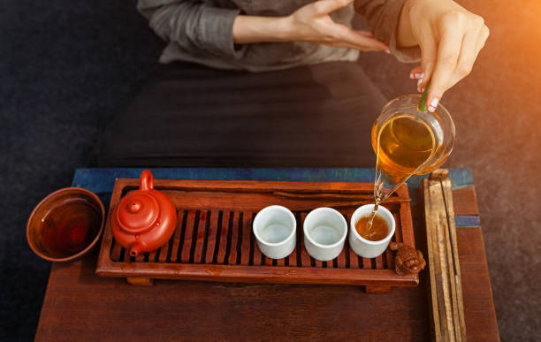 istock Chinese tea ceremony is perfomed by tea master in kimono 1031539100