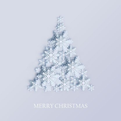 Abstract background with xmas tree made of volumetric paper snowflakes. White 3D snowflakes with shadow. Xmas and new year card template. Winter paper art design