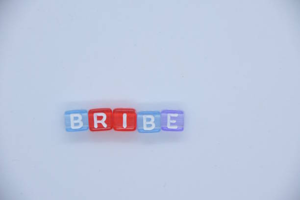 istock Word BRIBE made of letter cubes 1031560214