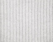 Warm gray knitted wool background