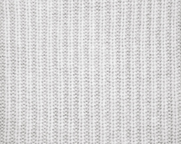 Warm gray knitted wool background Warm Gray Wool knit Close-up knitted stock pictures, royalty-free photos & images