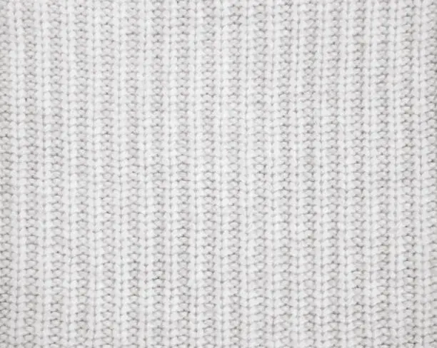 Photo of Warm gray knitted wool background