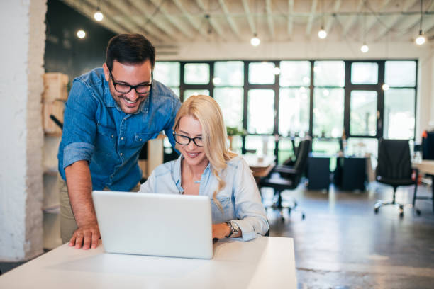 istock Creative business team working in bright coworking office. 1031563586