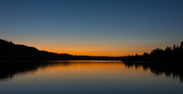 istock Sunset at the lake during our canoe-camping trip 1031567480