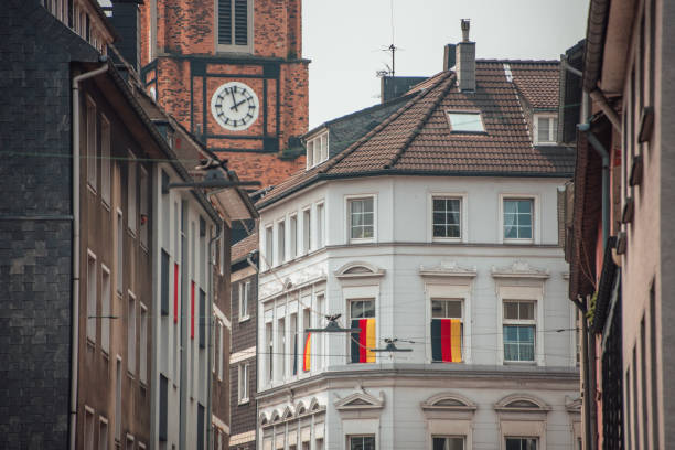Detail of a street in Germany with national German flags