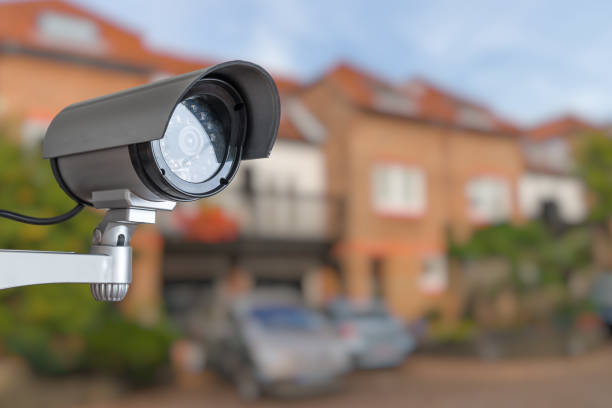 Security CCTV camera is monitoring home. Surveillance and safety concept. Security CCTV camera is monitoring home. Surveillance and safety concept. home recording studio setup stock pictures, royalty-free photos & images