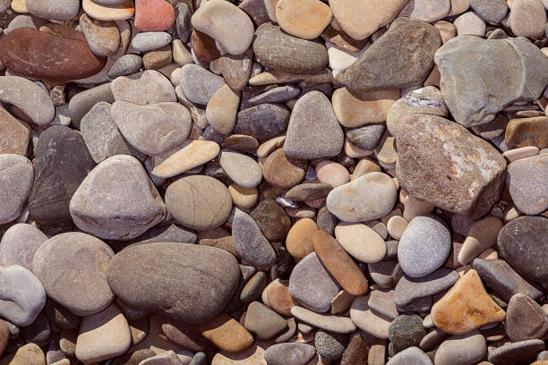 istock Round peeble stones background close up 1031580940