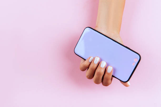 istock hands holding colorful smartphone case 1031592960